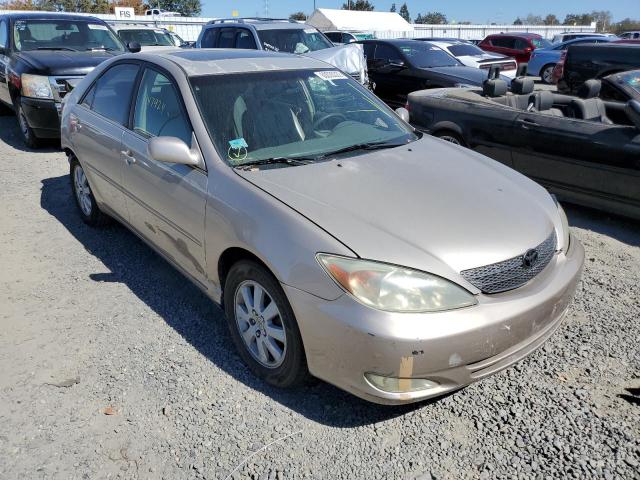 TOYOTA CAMRY LE 2004 with VIN 4T1BE30K94U272277 - Photo from auction