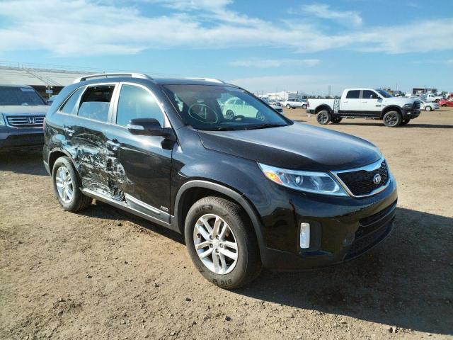 KIA SORENTO LX 2014 with VIN 5XYKTCA62EG430795 - Photo from auction