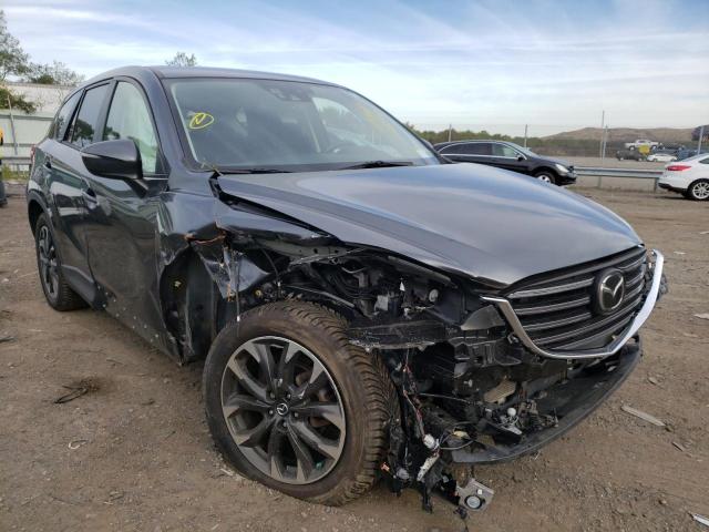 MAZDA CX-5 GT 2016 with VIN JM3KE4DYXG0715340 - Photo from auction