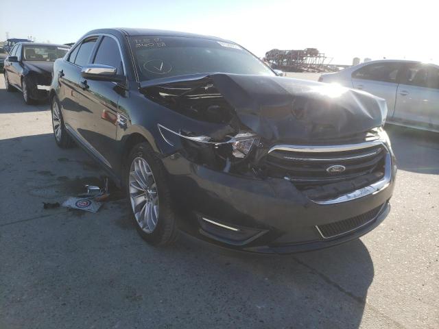 FORD TAURUS LIM 2014 with VIN 1FAHP2F84EG119780 - Photo from auction