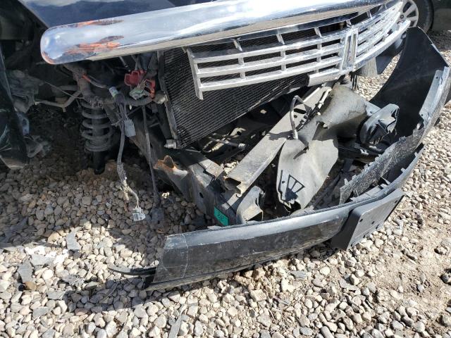 Photo 9 from auction – 2013 LINCOLN NAVIGATOR with VIN 5LMJJ2J51DEL00543