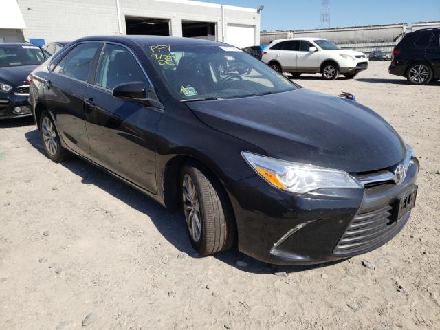 TOYOTA CAMRY LE 2015 with VIN 4T1BF1FK3FU965034 - Photo from auction