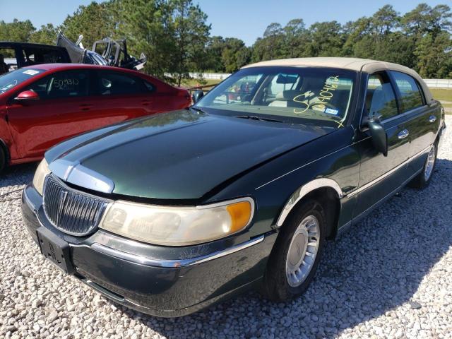 Photo 2 from auction – 2000 LINCOLN TOWN CAR E with VIN 1LNHM81W1YY820976