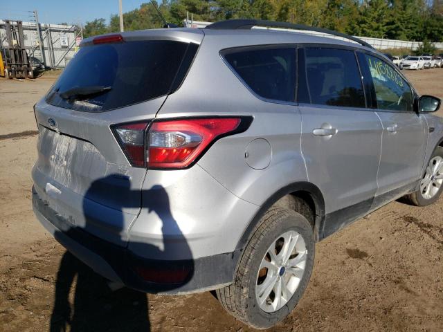 Photo 4 from auction – 2018 FORD ESCAPE SE with VIN 1FMCU9GDXJUC04759