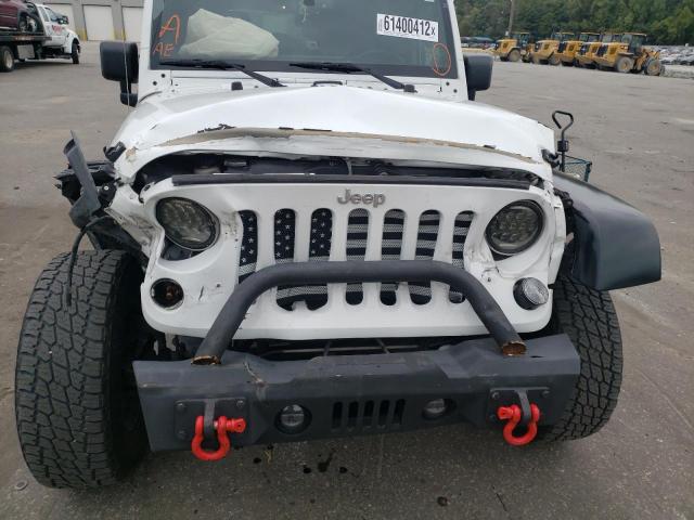 Photo 9 from auction – 2014 JEEP WRANGLER U with VIN 1C4BJWDG6EL139426