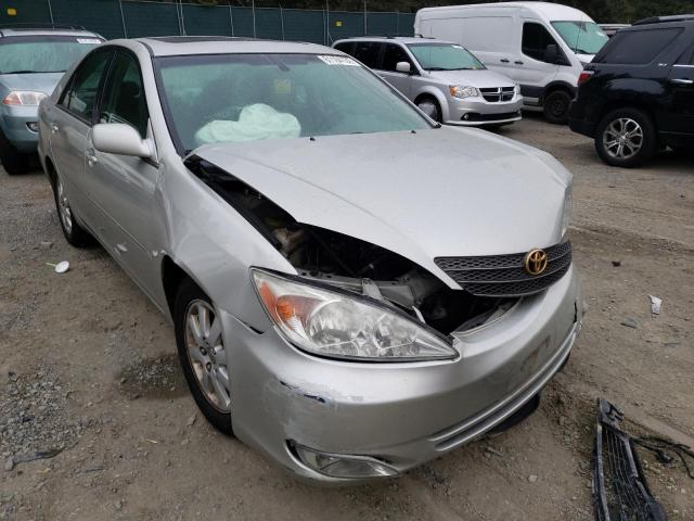 TOYOTA CAMRY LE 2003 with VIN 4T1BE30K33U735996 - Photo from auction