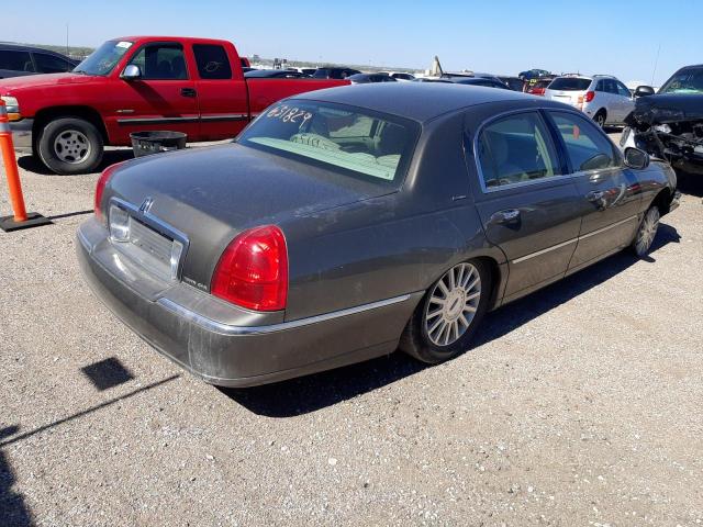 Photo 4 from auction – 2003 LINCOLN TOWN CAR E with VIN 1LNHM81W73Y698150