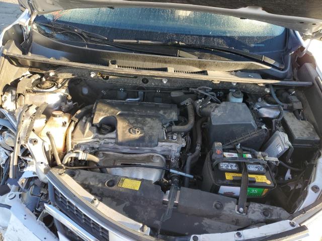 Photo 7 from auction – 2014 TOYOTA RAV4 LE with VIN JTMZFREV2EJ014434