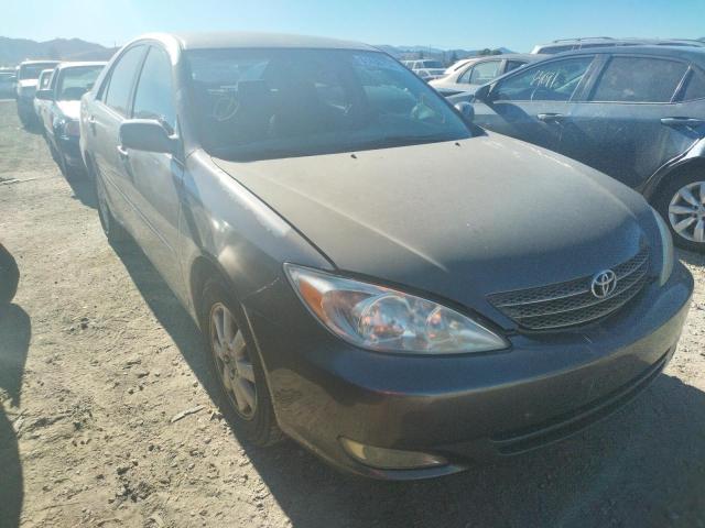 TOYOTA CAMRY LE 2003 with VIN 4T1BE30K73U730574 - Photo from auction