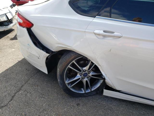 Photo 9 from auction – 2013 FORD FUSION HYB with VIN 3FA6P0H75DR200410