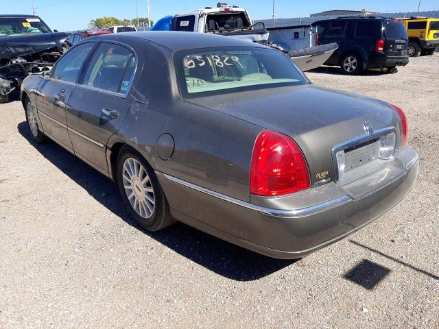 Photo 3 from auction – 2003 LINCOLN TOWN CAR E with VIN 1LNHM81W73Y698150