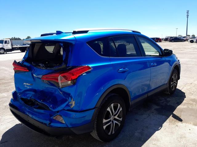 Photo 4 from auction – 2018 TOYOTA RAV4 LE with VIN JTMZFREV0JJ166240