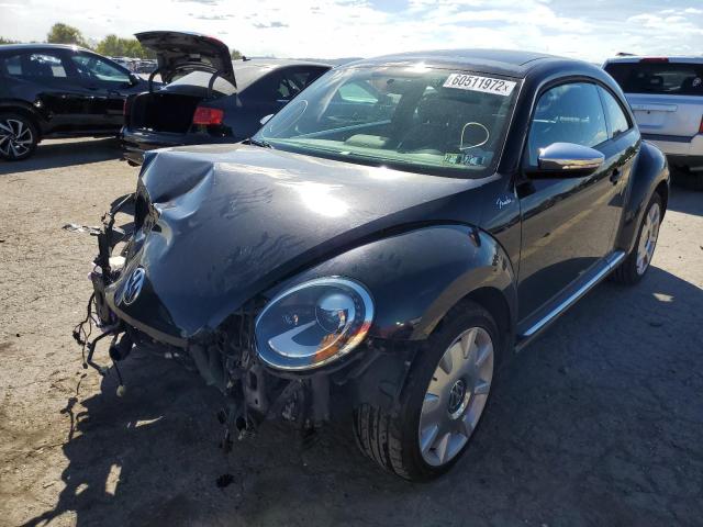 Photo 2 from auction – 2013 VOLKSWAGEN BEETLE TUR with VIN 3VWVA7AT1DM663453