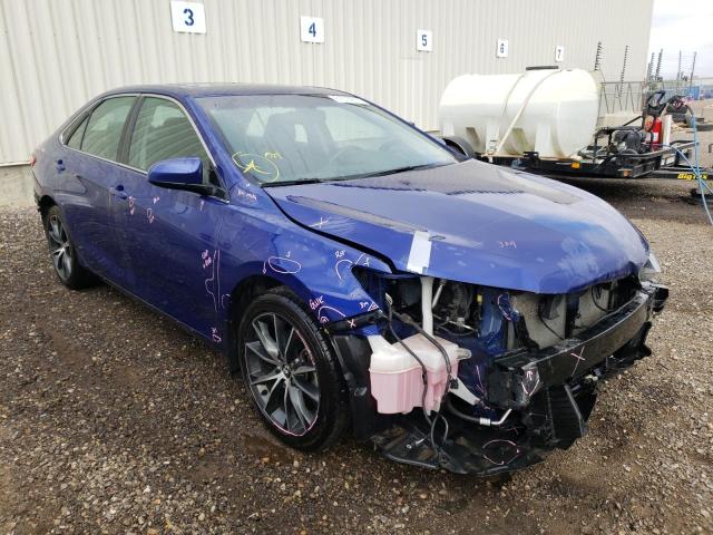 TOYOTA CAMRY LE 2015 with VIN 4T1BF1FK5FU915574 - Photo from auction