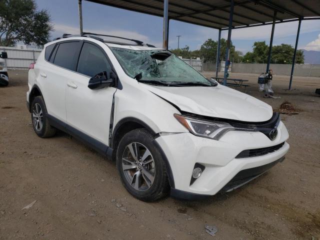 TOYOTA RAV4 XLE 2017 with VIN JTMWFREV5HJ713967 - Photo from auction