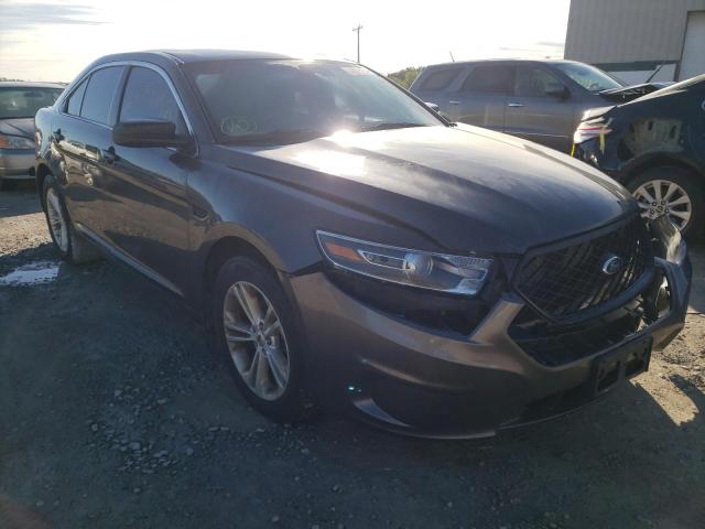 FORD TAURUS POL 2015 with VIN 1FAHP2MK1FG129036 - Photo from auction
