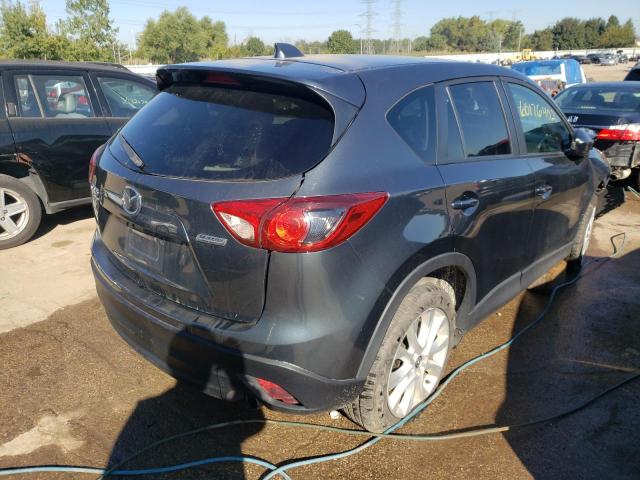 Photo 4 from auction – 2013 MAZDA CX-5 GT with VIN JM3KE4DE1D0105716