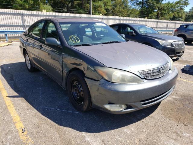 TOYOTA CAMRY LE 2003 with VIN 4T1BE32K33U712649 - Photo from auction