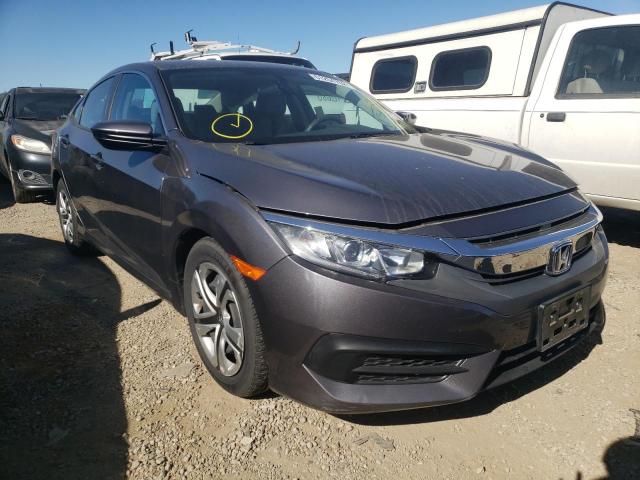 HONDA CIVIC LX 2018 with VIN 2HGFC2F57JH525619 - Photo from auction