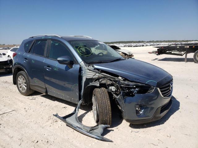 MAZDA CX-5 TOURI 2016 with VIN JM3KE4CY4G0719689 - Photo from auction