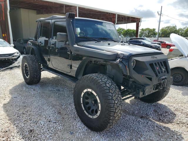 JEEP WRANGLER U 2014 with VIN 1C4BJWDG5EL139241 - Photo from auction