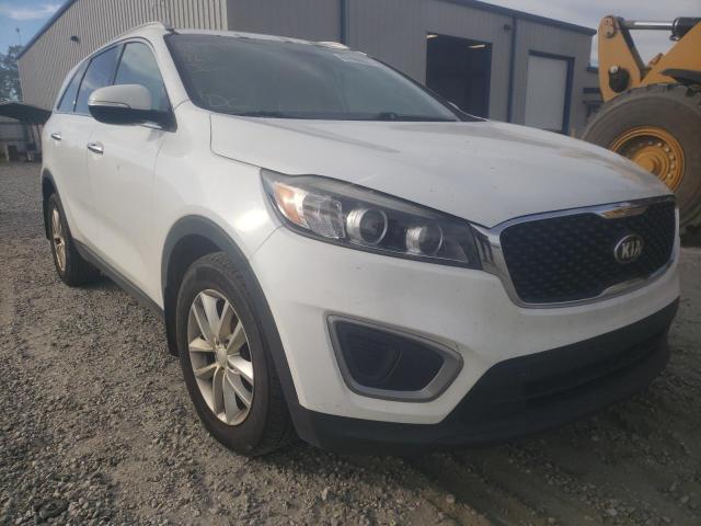 KIA SORENTO LX 2016 with VIN 5XYPG4A37GG077883 - Photo from auction