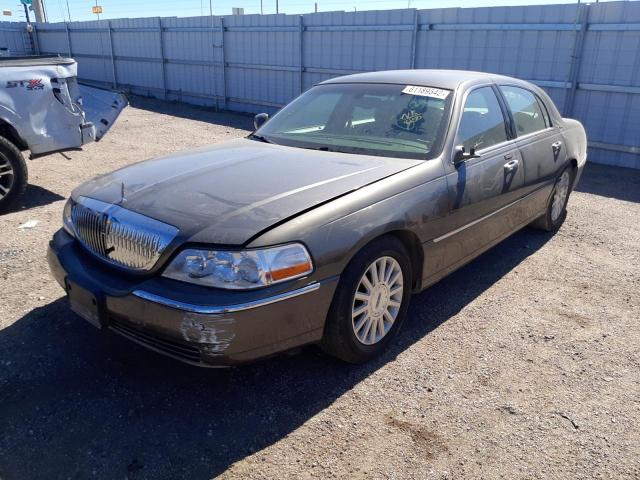 Photo 2 from auction – 2003 LINCOLN TOWN CAR E with VIN 1LNHM81W73Y698150