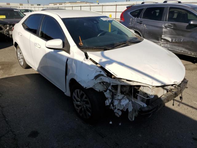 TOYOTA COROLLA L 2017 with VIN 5YFBURHEXHP580330 - Photo from auction