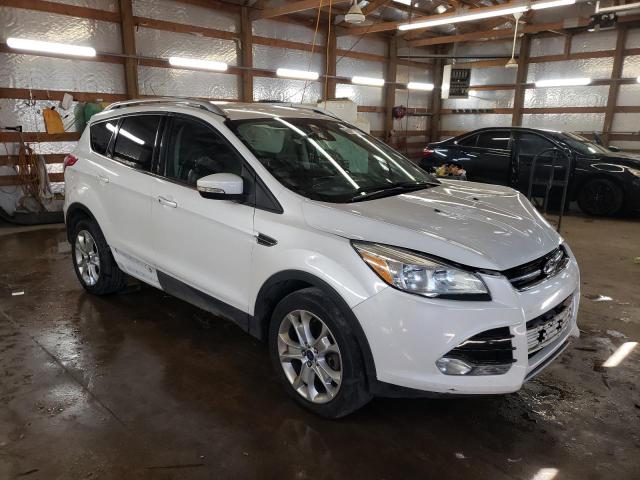 FORD ESCAPE TIT 2016 with VIN 1FMCU9JX7GUC21479 - Photo from auction