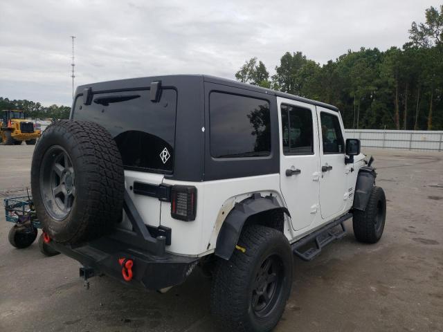 Photo 4 from auction – 2014 JEEP WRANGLER U with VIN 1C4BJWDG6EL139426