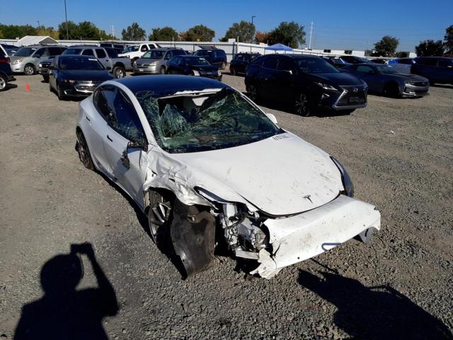 TESLA MODEL 3 2022 with VIN 5YJ3E1EBXNF124476 - Photo from auction