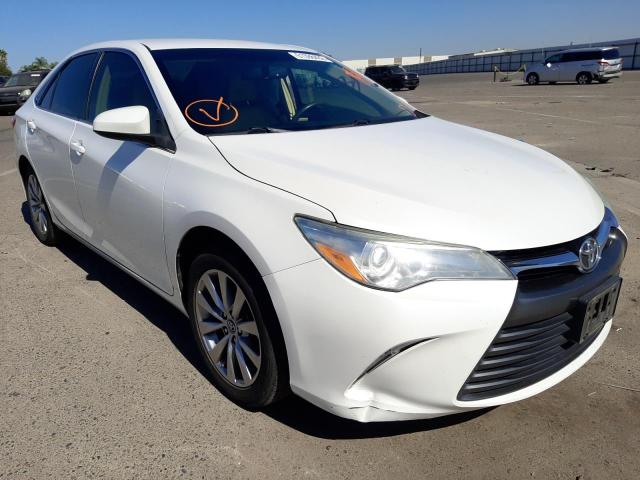 TOYOTA CAMRY LE 2015 with VIN 4T1BF1FK4FU082706 - Photo from auction