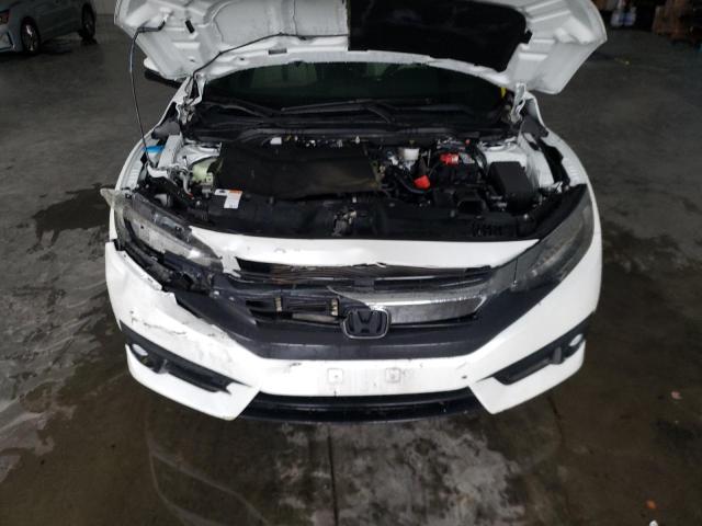 Photo 7 from auction – 2017 HONDA CIVIC TOUR with VIN 2HGFC3B93HH353839