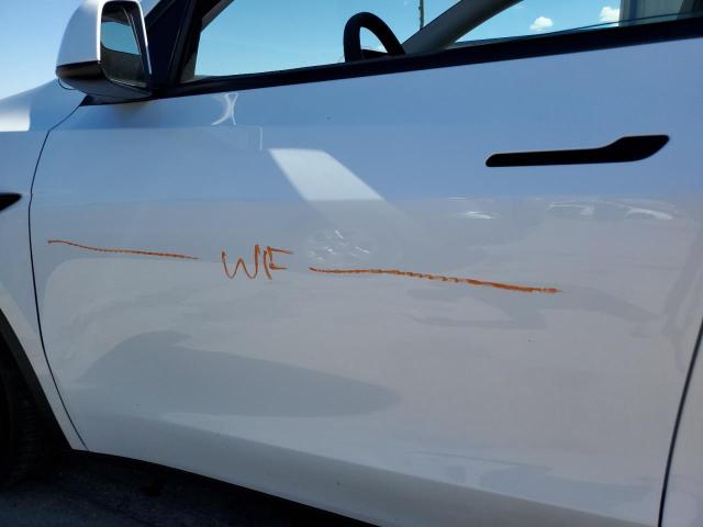 Photo 9 from auction – 2022 TESLA MODEL Y with VIN 7SAYGDEF5NF506292