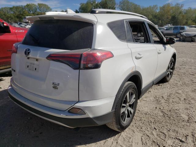 Photo 4 from auction – 2016 TOYOTA RAV4 XLE with VIN JTMWFREV7GJ096618