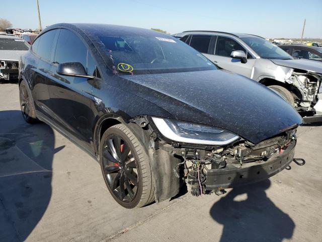 TESLA MODEL X 2016 with VIN 5YJXCAE44GF001235 - Photo from auction