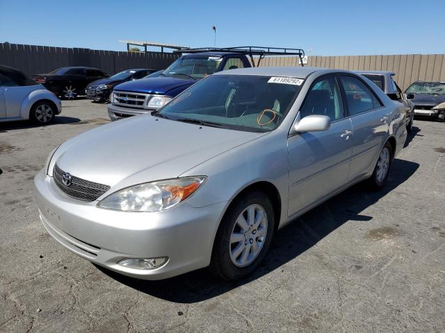 Photo 2 from auction – 2003 TOYOTA CAMRY LE with VIN 4T1BE30K13U705184