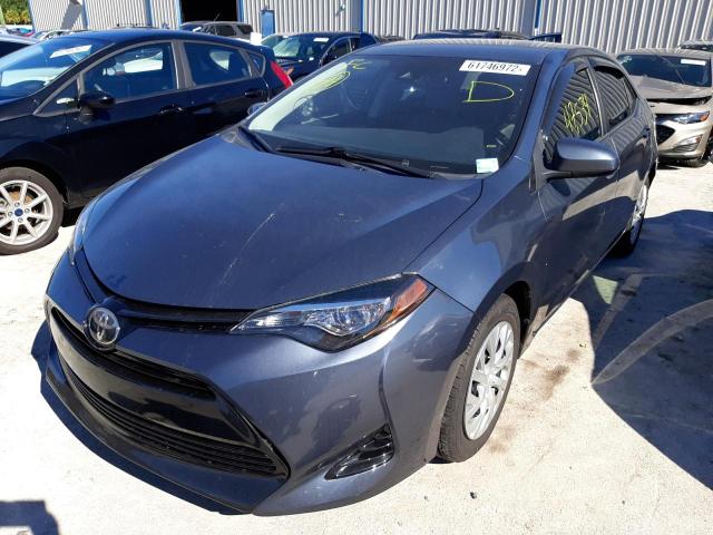 Photo 2 from auction – 2017 TOYOTA COROLLA L with VIN 5YFBURHE6HP695281
