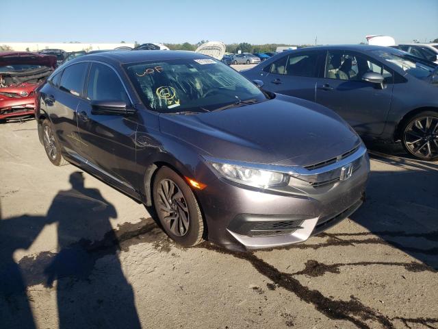 Photo 1 from auction – 2018 HONDA CIVIC EX with VIN 19XFC2F79JE027269