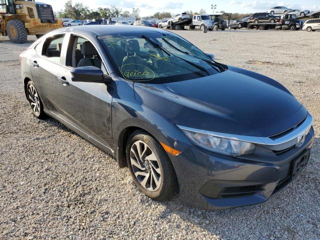 HONDA CIVIC EX 2018 with VIN 19XFC2F77JE001737 - Photo from auction