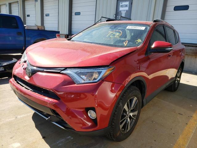 Photo 2 from auction – 2017 TOYOTA RAV4 XLE with VIN JTMWFREV1HJ140176