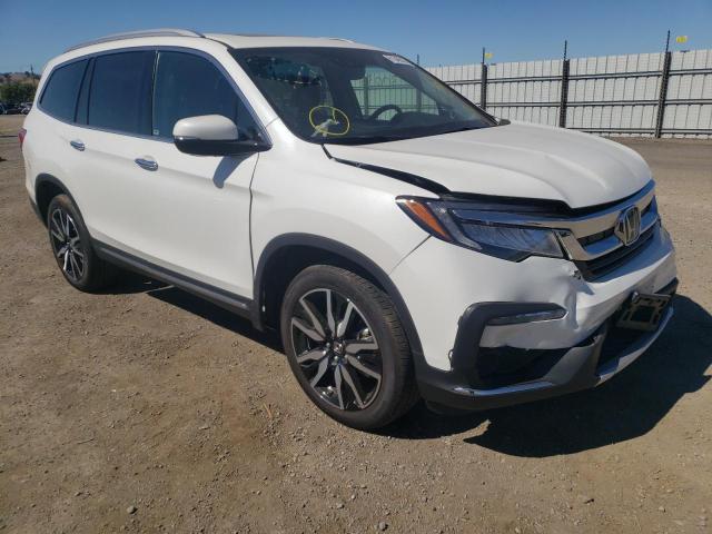 Photo 9 from auction – 2021 HONDA PILOT ELIT with VIN 5FNYF6H01MB074138