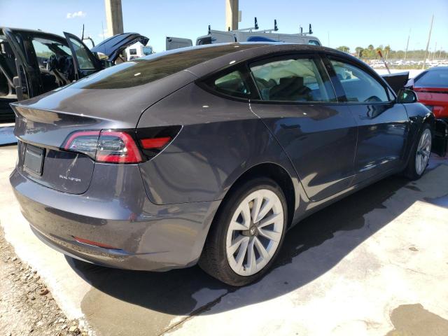 Photo 4 from auction – 2022 TESLA MODEL 3 with VIN 5YJ3E1EB9NF103229