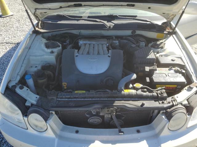 Photo 7 from auction – 2005 KIA OPTIMA LX with VIN KNAGD128255429000