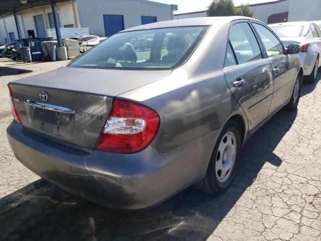 Photo 4 from auction – 2002 TOYOTA CAMRY LE with VIN JTDBE32K320042143