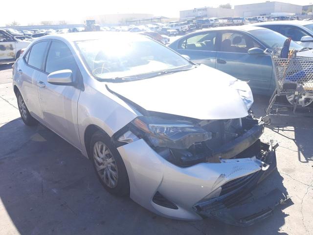 TOYOTA COROLLA L 2017 with VIN 5YFBURHE2HP667803 - Photo from auction