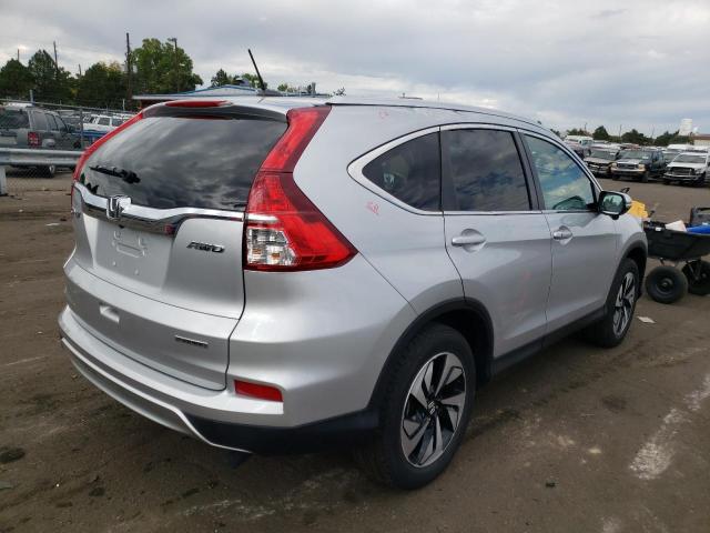 Photo 4 from auction – 2016 HONDA CR-V TOURI with VIN 5J6RM4H94GL073218