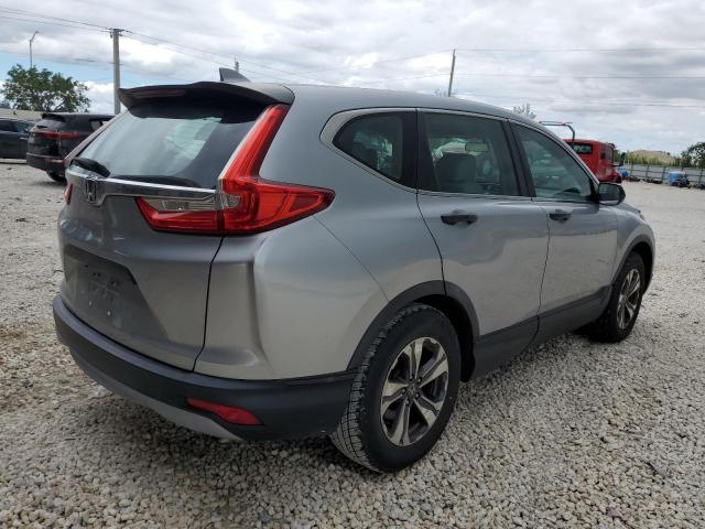 Photo 4 from auction – 2017 HONDA CR-V LX with VIN 7FARW5H31HE014007