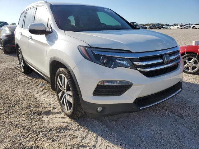 HONDA PILOT ELIT 2017 with VIN 5FNYF6H04HB104934 - Photo from auction