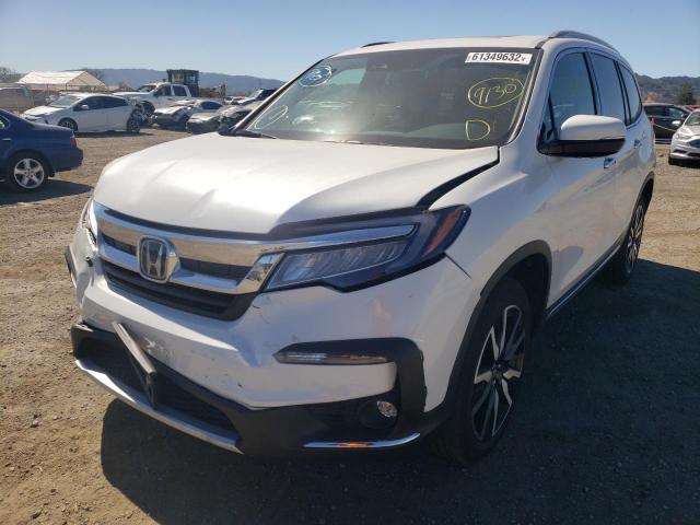 Photo 2 from auction – 2021 HONDA PILOT ELIT with VIN 5FNYF6H01MB074138